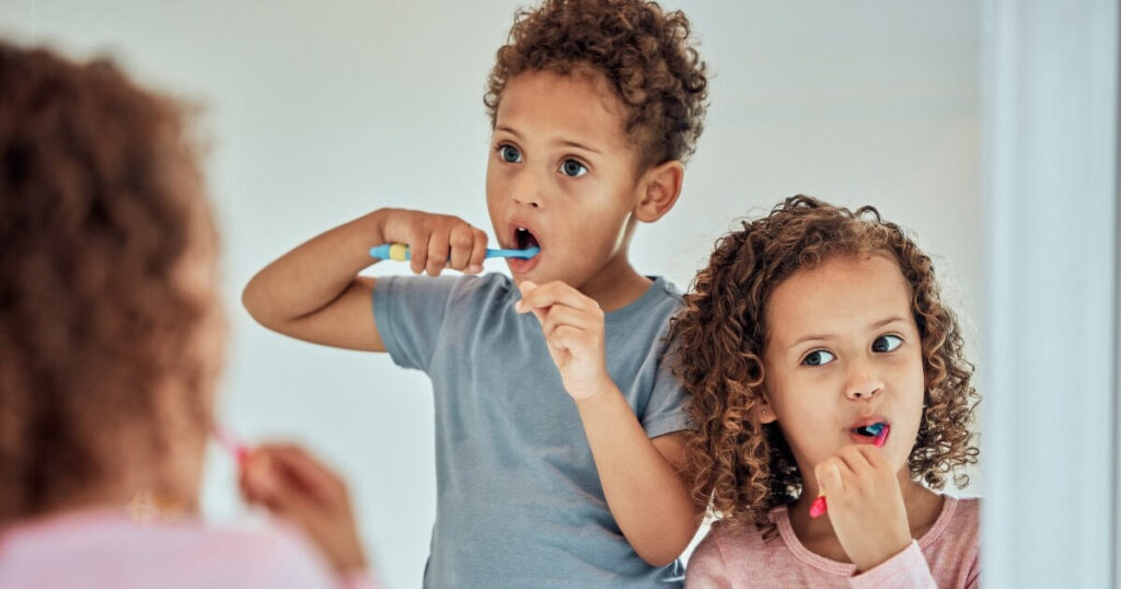 Children brushing their teeth